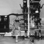 На фото: автоматическая печать на предметных стёклах для микроскопа. Модель CC-5000